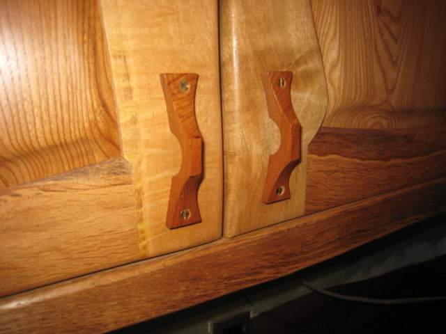 Kitchen door detail Handle detail on an oak and elm kitchen